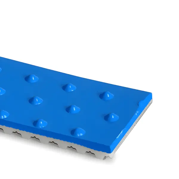Nahaufnahme eines Zahnriemenanschnitts mit blauer Beschichtung, glatter Oberfläche und regelmäßigen runden Noppen.