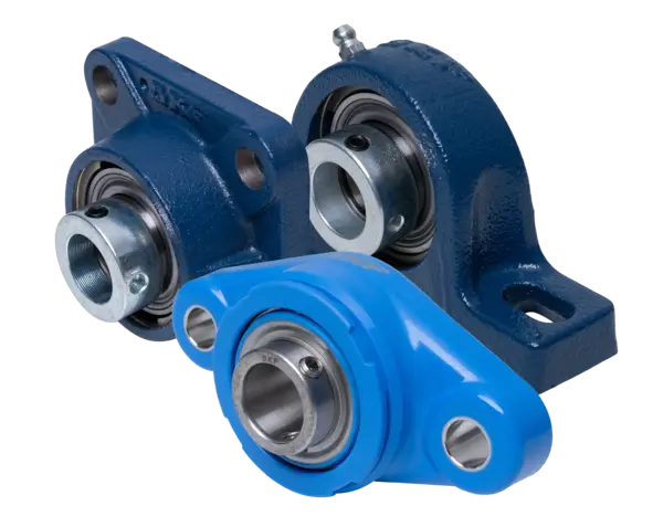 Produktabbildung mehrerer Lagereinheiten in unterschiedlichen Bauformen und Farben – zeigt Steh- und Flanschlager mit eingesetztem Wälzlager und Metallgehäuse, ausgelegt für industrielle Anwendungen.